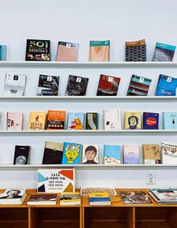 Bookstore shelves displaying various colorful books